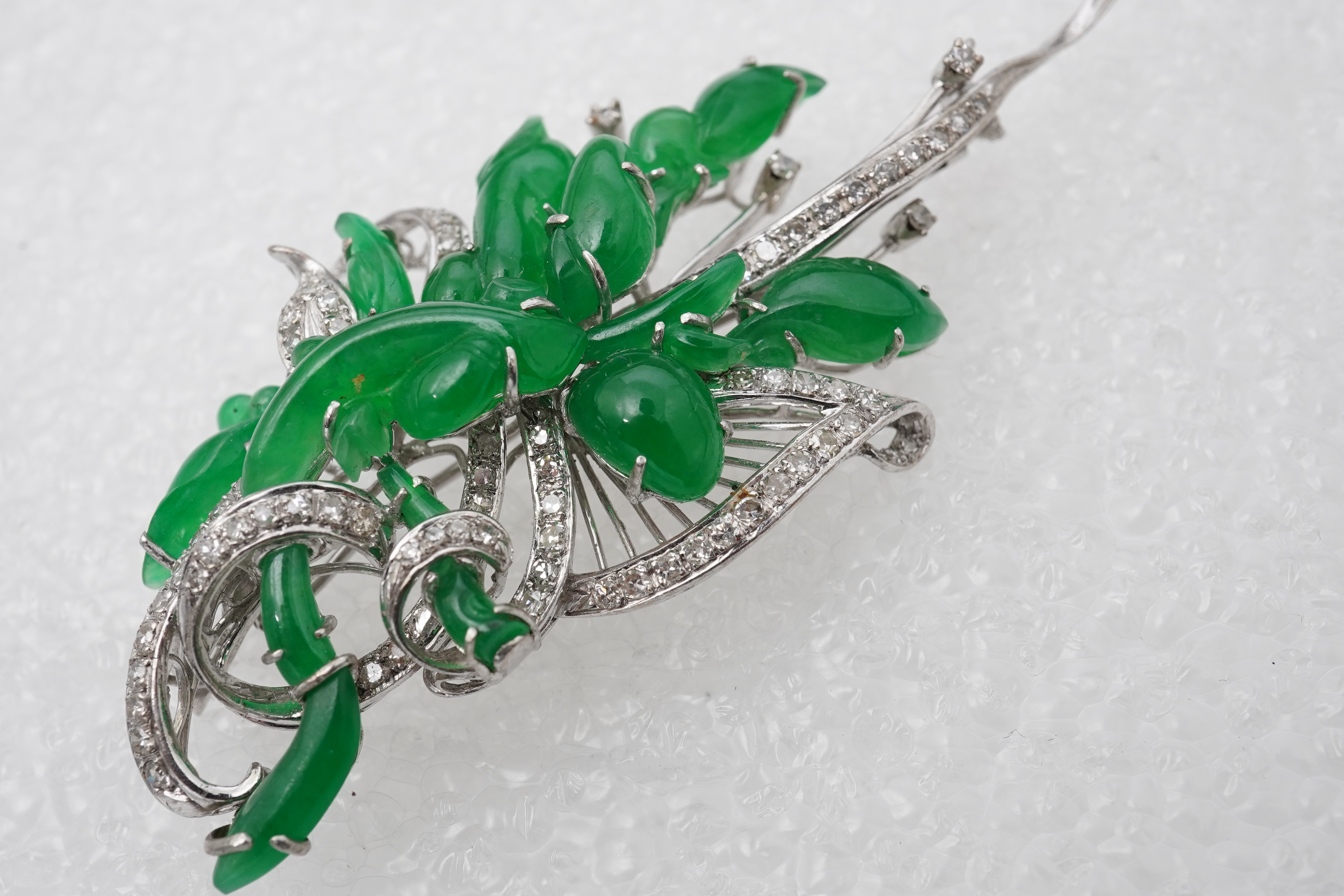A fine jadeite and diamond brooch, 1960s